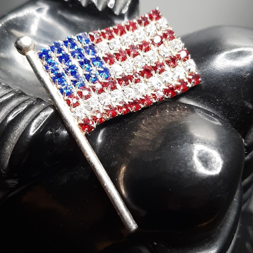 American flag brooch with red white and blue rhinestones